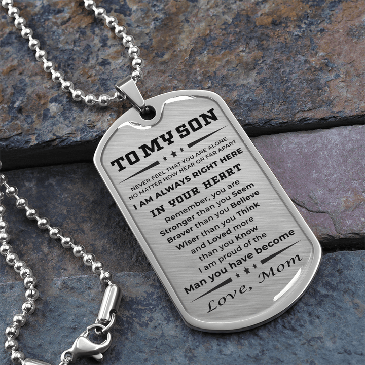 Premium Photo | Dog tag, military badge with chain and isolated on black  background with space for text